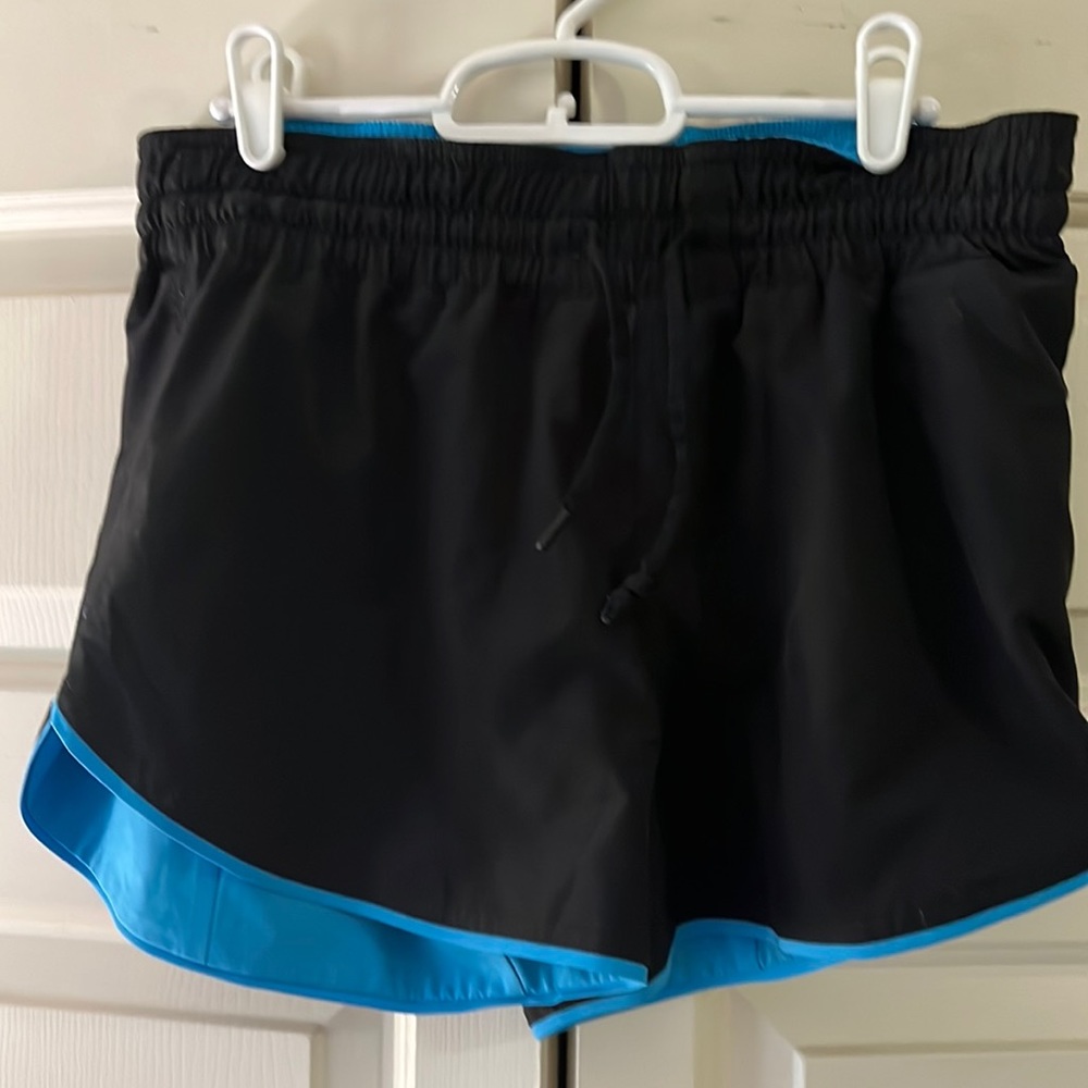 Zyia ocean blue flip shorts. Size medium.